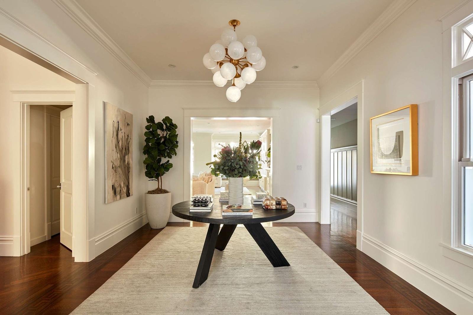 Beautifully painted interior room with white walls and modern decor by Santi Painting Inc.